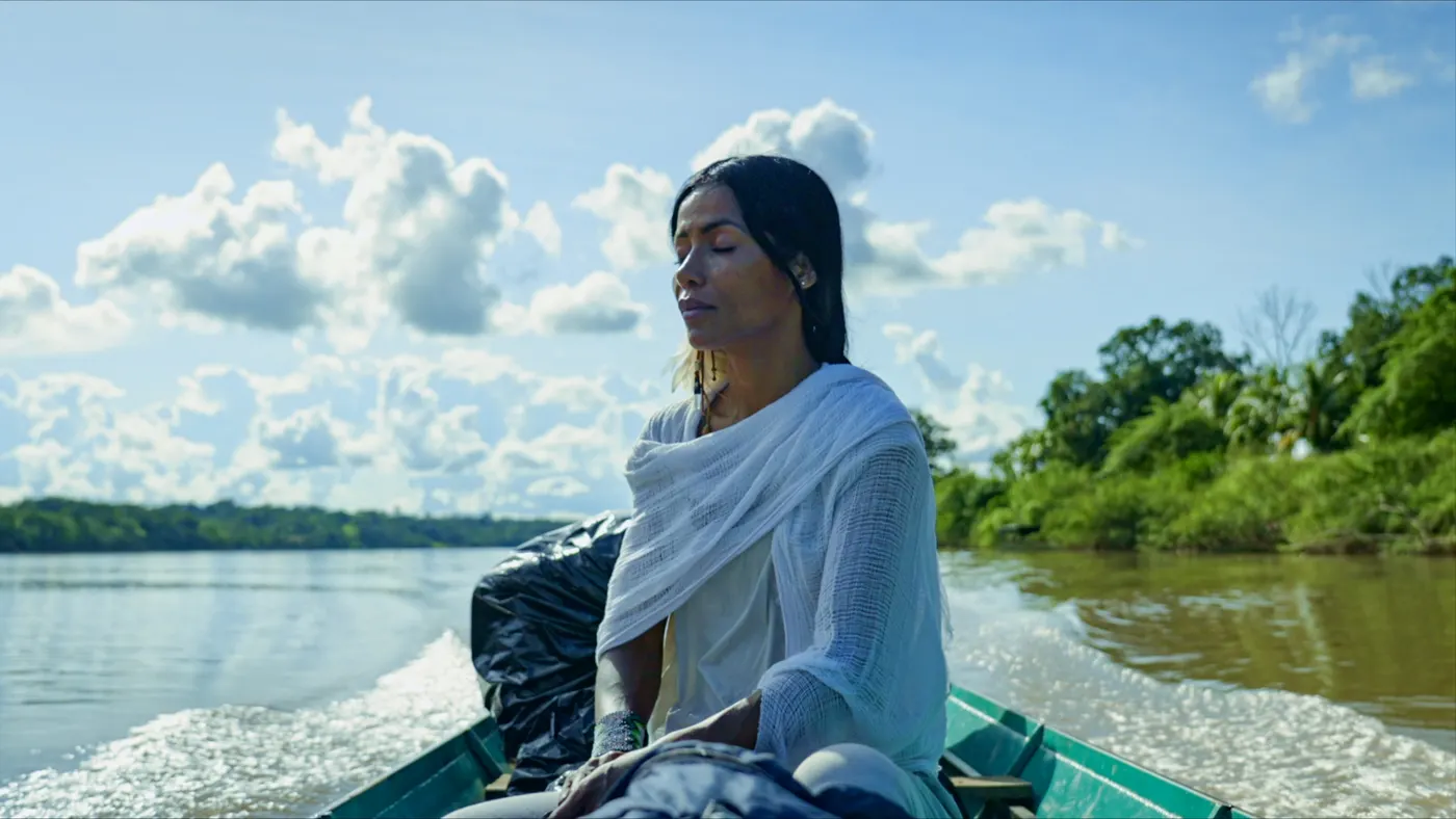Tatiana on a boat on the river, from the film Curandera